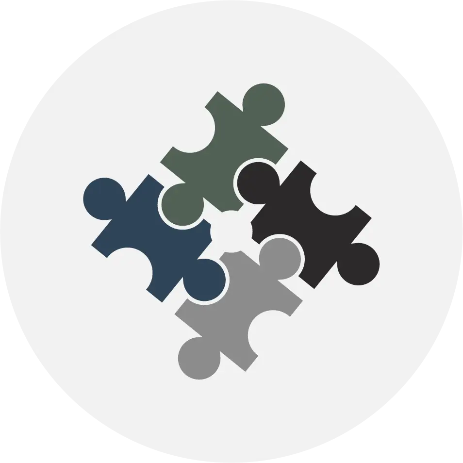 A group of four puzzle pieces in the shape of a circle.