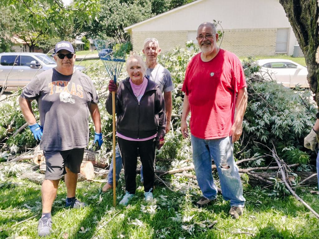 Toolbox volunteers helping a family.