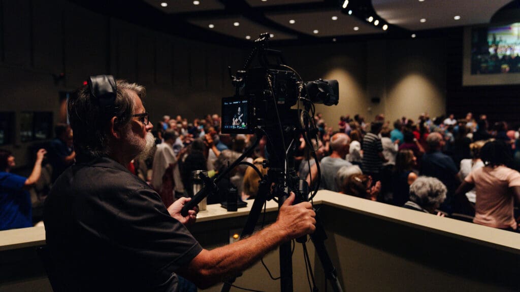 Worship Arts volunteer running the camera.